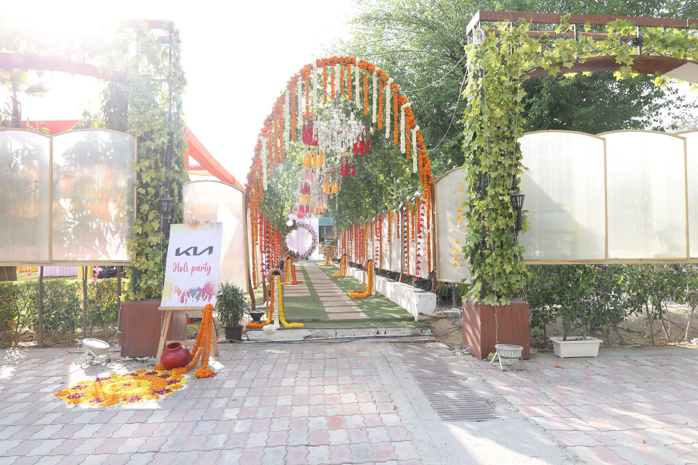 A marigold-lined entrance prepared for a wedding celebration