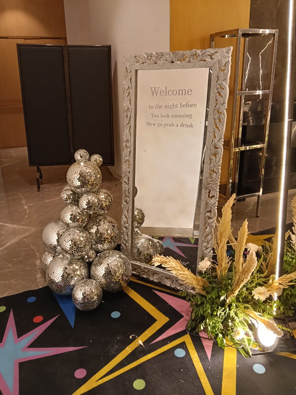 A mirror and silver decorative installation for a private function
