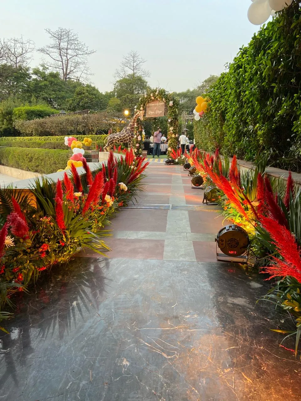 A flower-lined path arranged for a birthday celebration