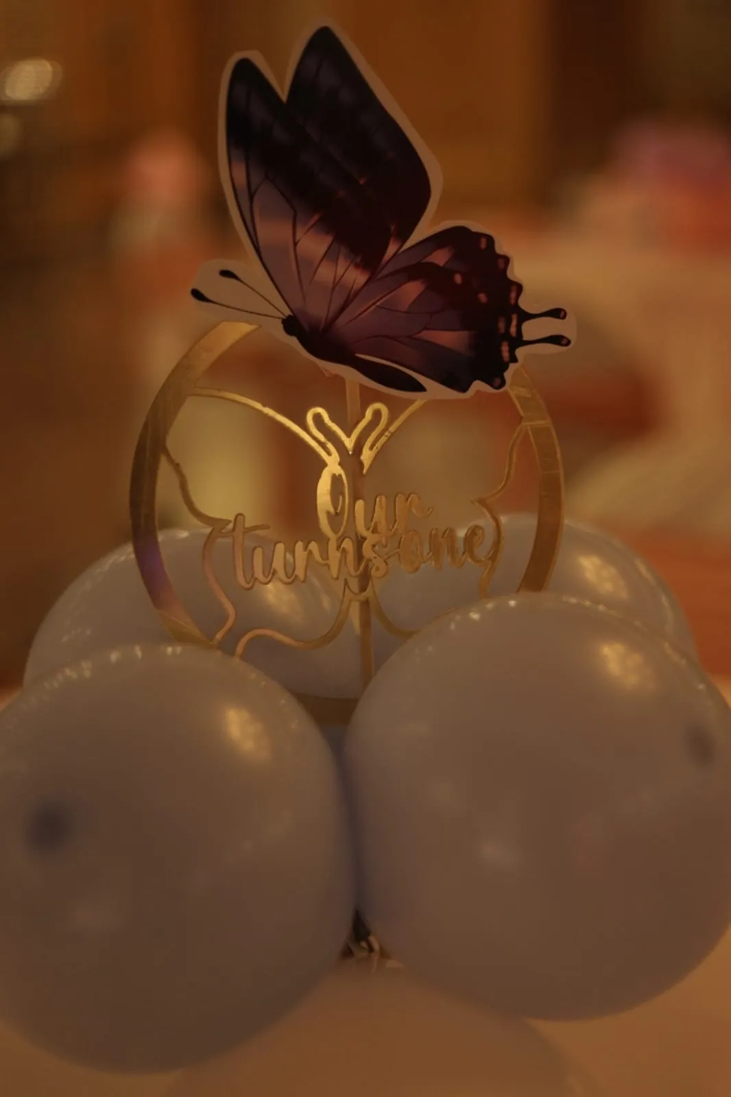 A gold celebration balloon display