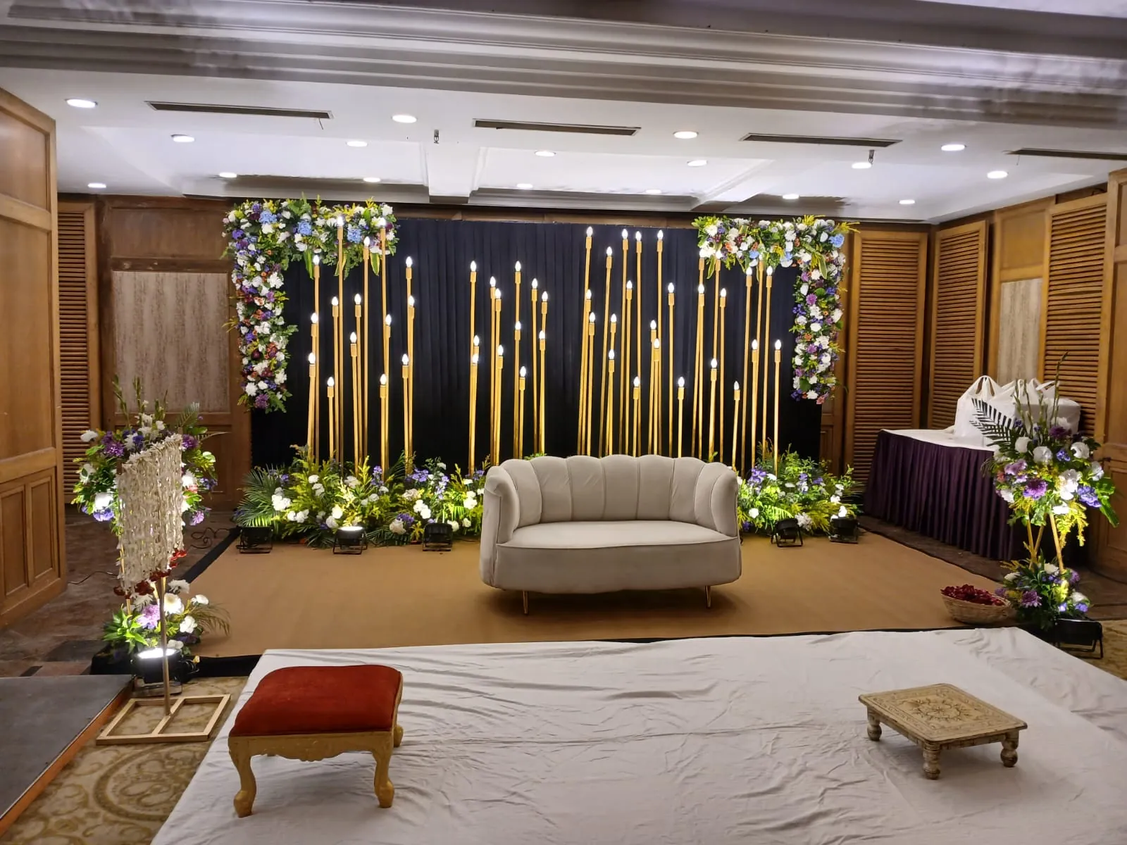 A wedding stage with guest seating prepared for a ceremony