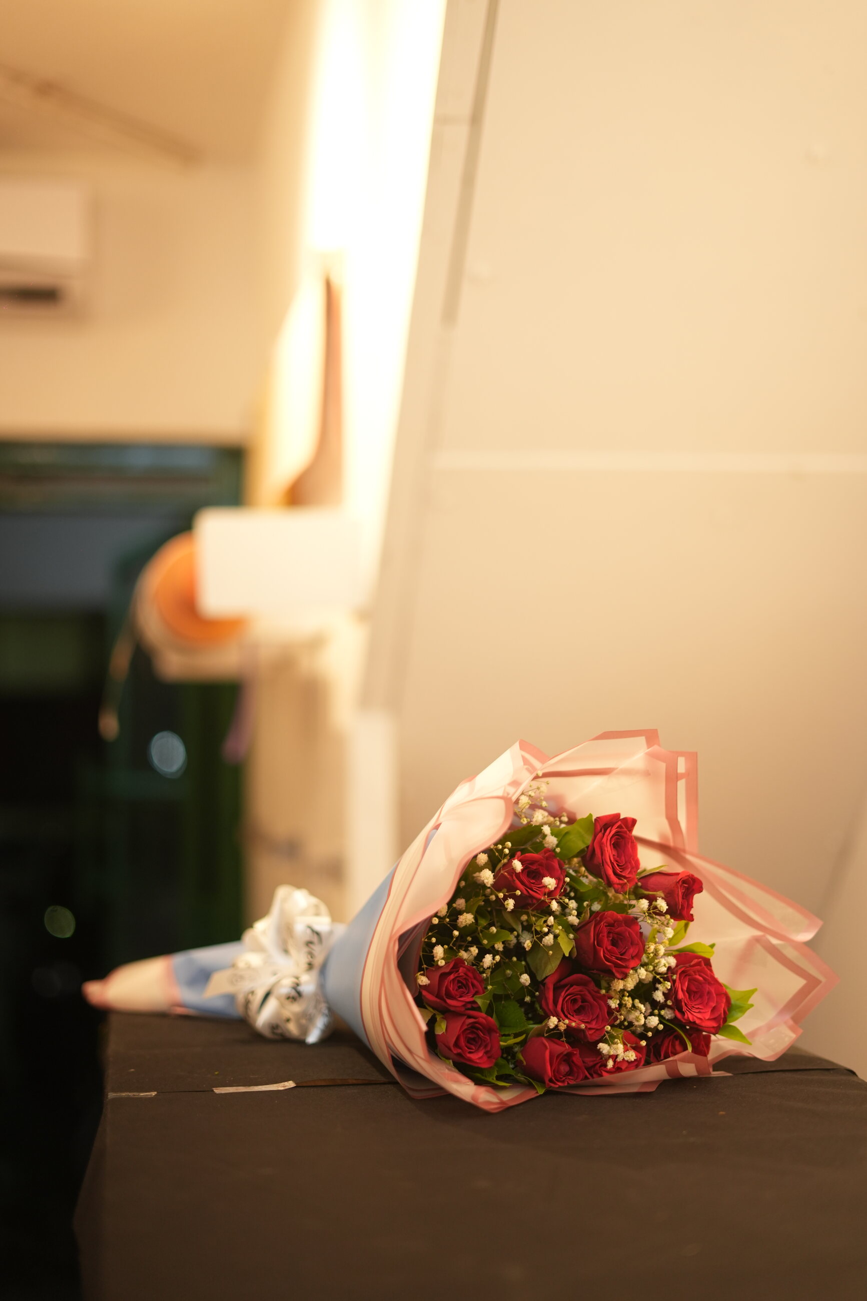 A large bouquet of red roses